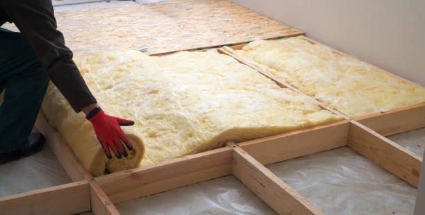 Work composed of mineral wool insulation in the floor, floor heating insulation , warm house, eco-friendly insulation, a builder at work Work composed of mineral wool insulation in the floor, floor heating insulation , warm house, eco-friendly insulation, a builder at work mineral stock pictures, royalty-free photos & images
