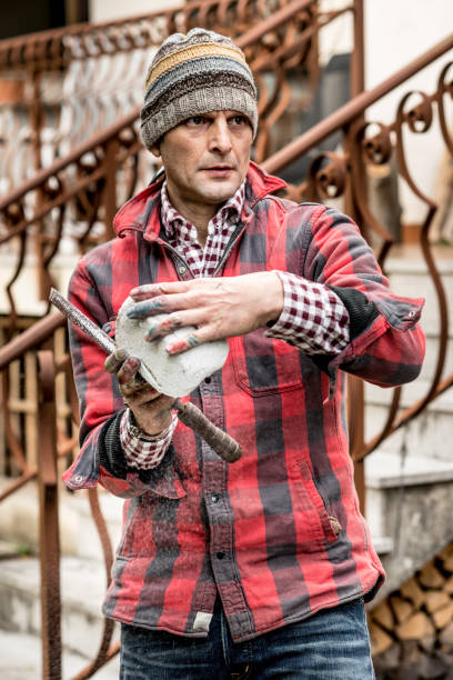istock Mid Adult Artist Man Sculpturing an Artwork 886186936