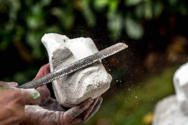istock Mid Adult Artist Man Sculpturing an Artwork 886186950