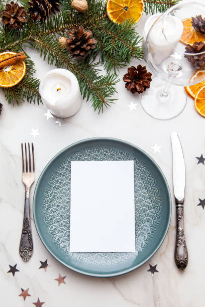 istock Christmas table setting with xmas decorations over gray stone table. Top view copy space. 886187108