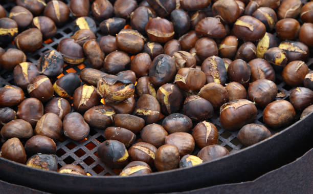 istock roast chestnuts cooked over the  grill 886193842