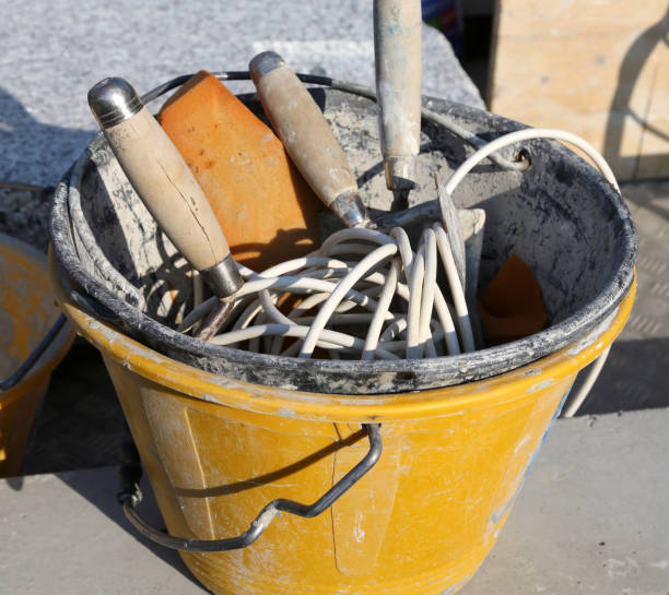 istock plastic bucket bricklayer with tools for the construction of the 886194466