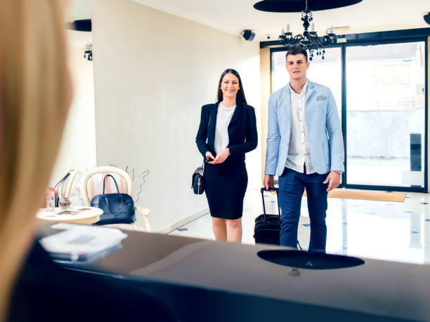 istock Couple arriving at a hotel 886199248