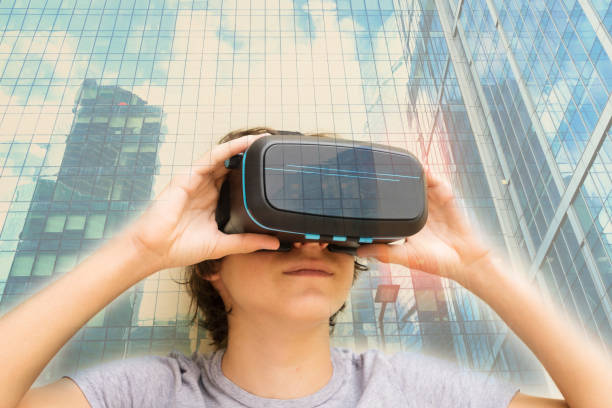 istock Teenager wearing VR glasses 886201744