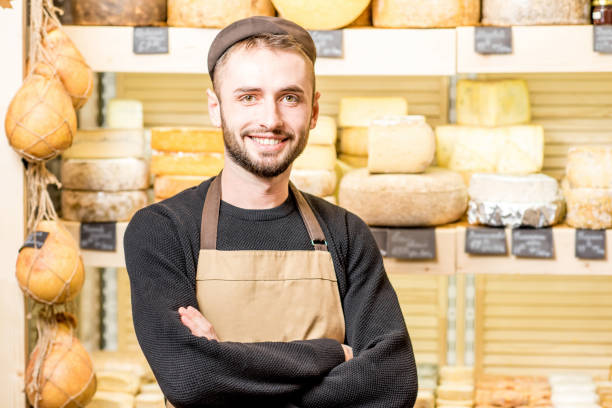 istock Cheese seller portrait 886202478