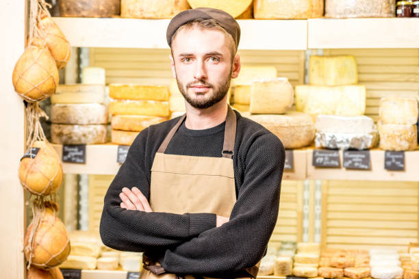 istock Cheese seller portrait 886202516