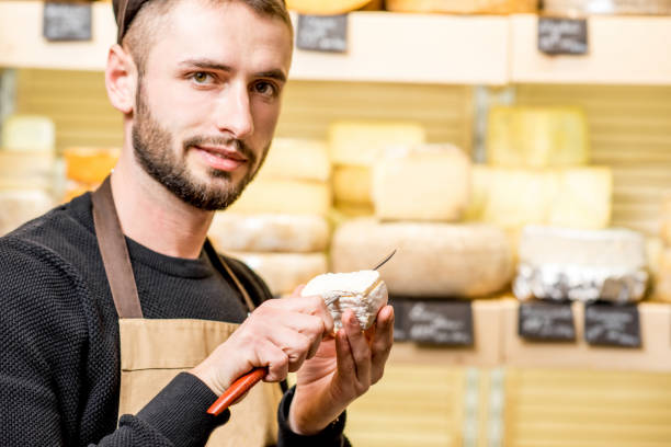 istock Cheese seller portrait 886205438