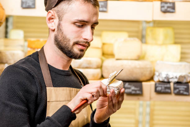 istock Cheese seller portrait 886205556