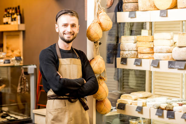 istock Cheese seller portrait 886208332