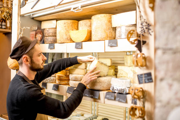 istock Cheese seller at the shop 886210152