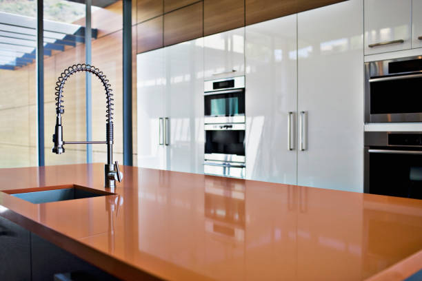 interior of modern kitchen with spray nozzle - meja dapur mebel potret stok, foto, & gambar bebas royalti