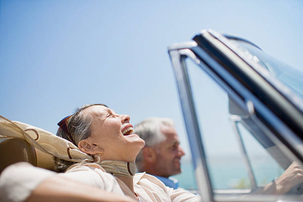 熟年カップルの運転に転換 - 40s mature couple couple smiling ストックフォトと画像