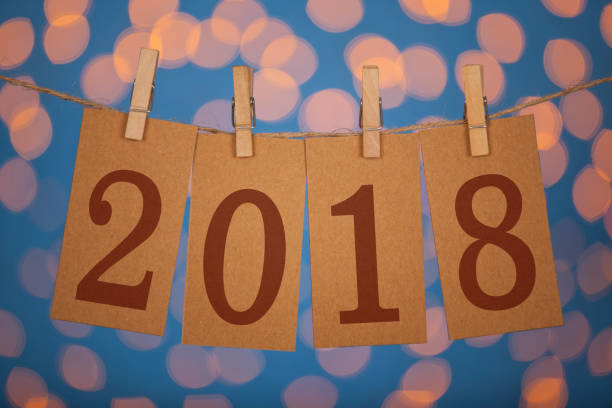 istock New Year 2018 Concept Clipped Cards and Lights 886243926