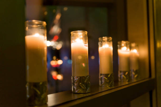 istock Glowing Candles at Holiday Party 886275876