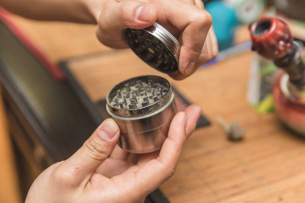 Opening Metal Cannabis Grinder stock photo