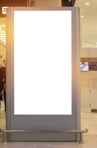 istock Blank billboard advertising panel in terminal airport, Mock up white screen, insert for text of customer. Space for texting in products or promotional at airport,train station,advertising public commercial. 886280700