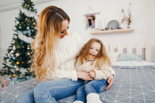 istock mother and daughter playing 886280776