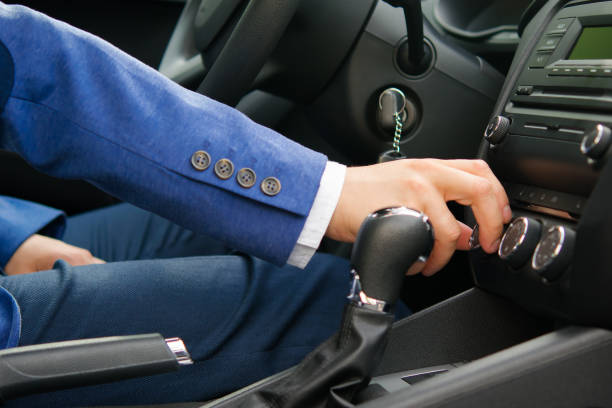 istock man in the car regulates climate control 886294704