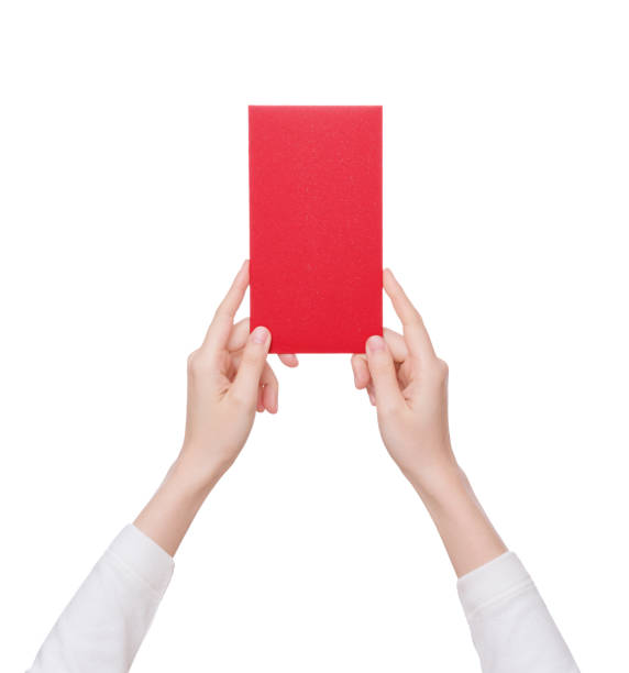 istock Chinese woman's hand holding with chinese red envelope,on white background 886308944
