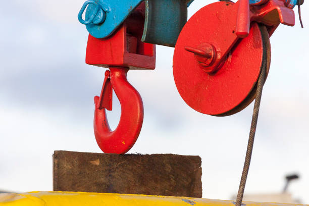 detail of crane hook against  sky