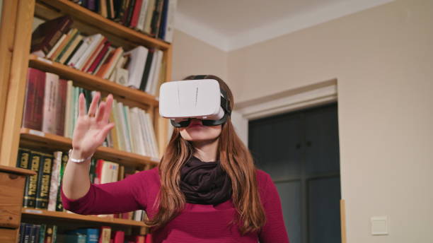 istock Young Woman in Virtual Reality Glasses 886328496