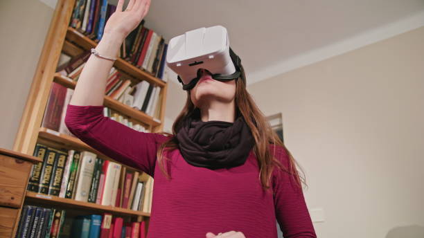 istock Young Woman in Virtual Reality Glasses 886328536