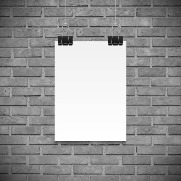 istock Black and white brick wall and paper poster for text, backgrpund mock up. Realistic black paper clamp. For Your business project. Vector Illustration 886343378