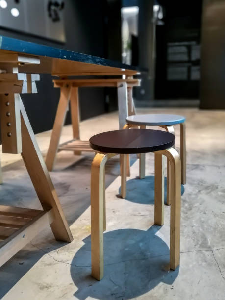 istock Modern work table with wooden chair at chic design workspace 886354710