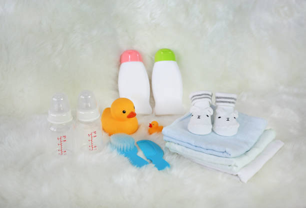 istock Children's bath products and hygiene items on white fur. 886357238