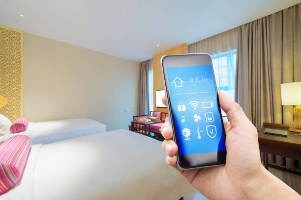 istock smart phone with smart home with modern bedroom 886374294