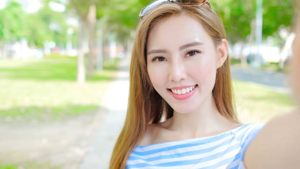istock woman selfie happily 886374298