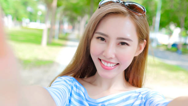 istock woman selfie happily 886381422
