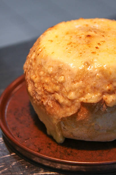 istock French Onion Soup in gratinated cheese bread 886382254
