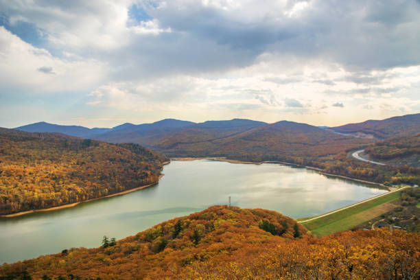 istock a large reservoir, top view. autumn forest and high blue sky, 886388000