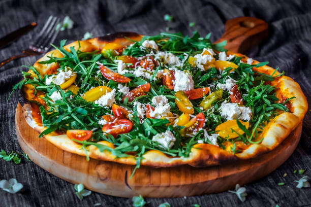 istock Pizza with tomatoes and  feta cheese 886399614