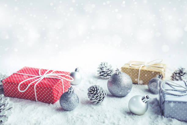 istock Christmas gift box,present with ornament on snow background. 886402298