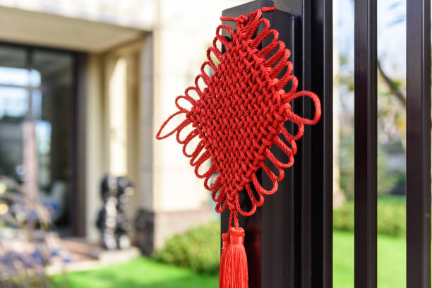 istock The red Chinese knot on the door 886402464
