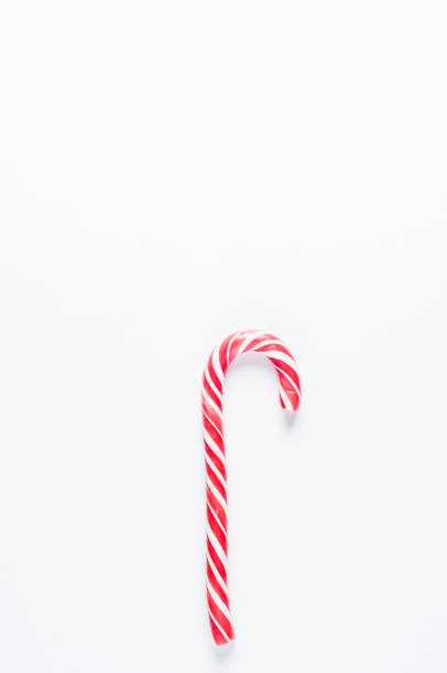 istock Red candy on white background. Christmas decorations 886421510