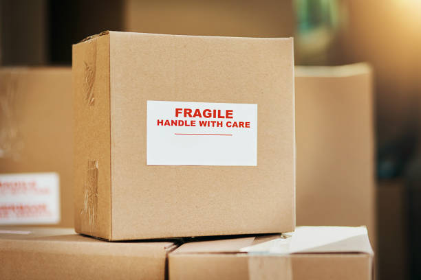 Fragile contents inside Still life shot of cardboard boxes marked as fragile and ready for delivery fragility stock pictures, royalty-free photos & images