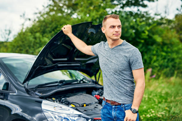 istock He's in desperate need of some roadside assistance 886429206
