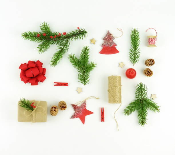 istock christmas background. creative abstract composition of xmas decorations, branches of Christmas tree, gifts, balls on white background.Flat lay. Top view. Copy space 886441938
