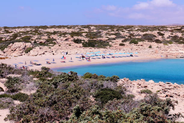 istock gorgeous Diakoftis beach with people sunbathing 886453576