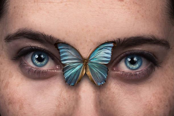 istock Beautiful woman eye wit butterfly wing 886458872