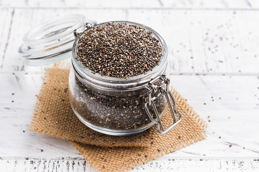 Healthy chia seeds in a glass jar. Healthy eating concept. Copy space