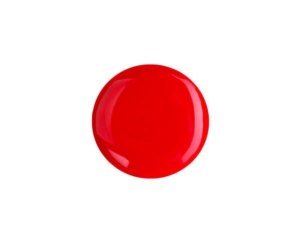 istock A drop of red nail polish on white 886503202