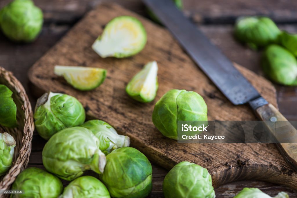 Brussels Sprouts Fresh Brussels Sprouts on a Cutting Board Brussels Sprout Stock Photo