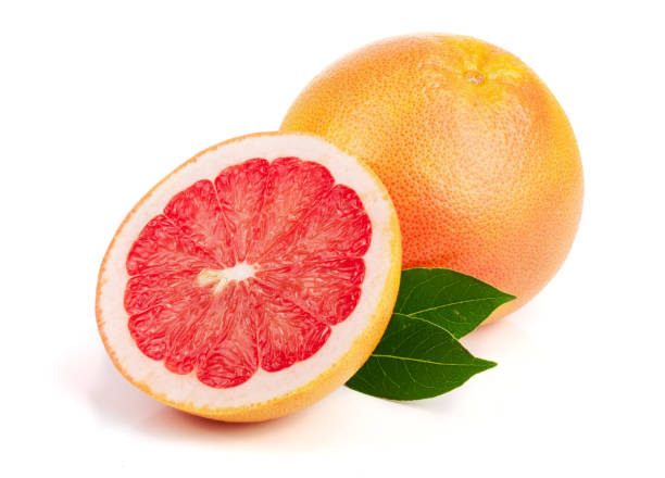 istock grapefruit and half with leaves isolated on white background 886507454