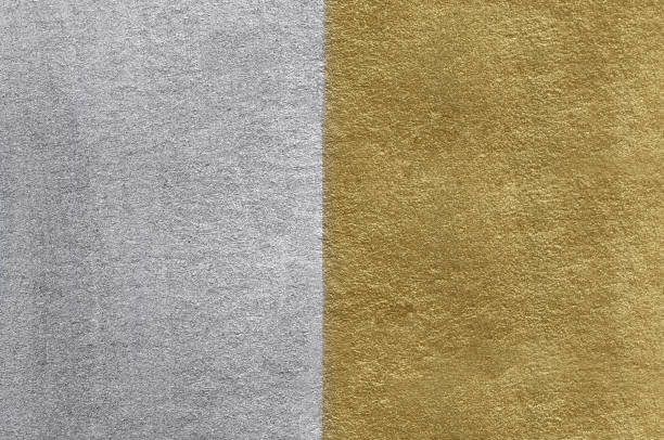 istock Gold and silver foil texture. Golden abstract background 886526322