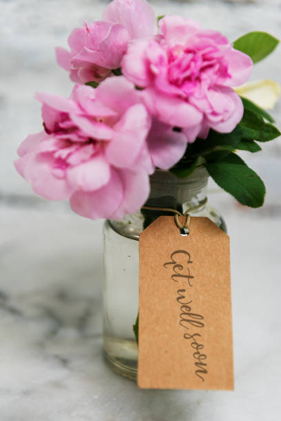 istock Pink flower with wishing label 886533112