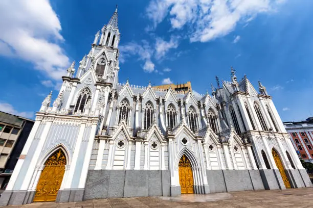 Blue skies over the dramatic Gothic La Ermita Church in Cali, Colombia.